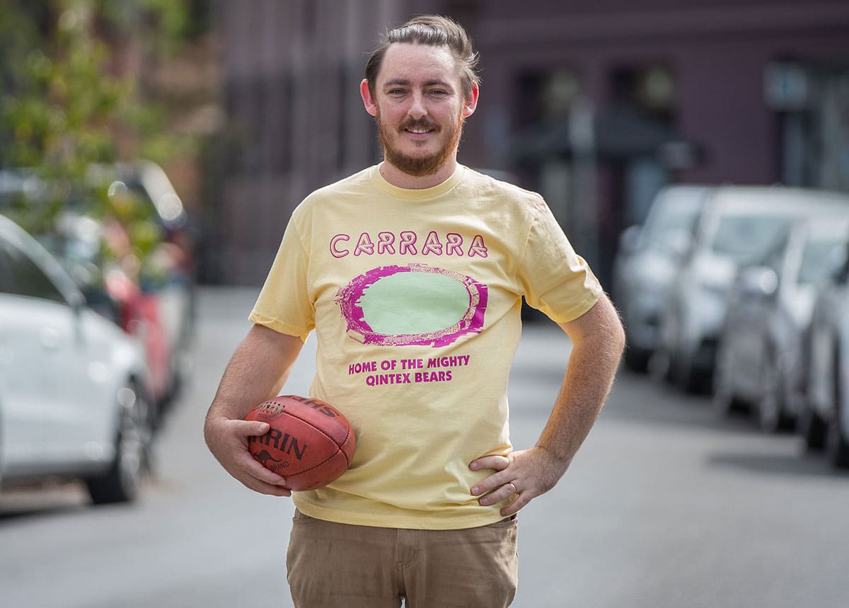 the holy boot holding a football